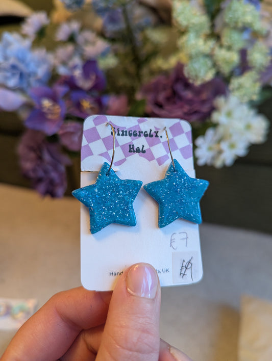 Blue glitter star hoops
